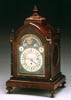 An exceptionally fine Regency mahogany and ebony seven-tune moon dial bracket clock signed on the white enamel dial Michael Schwartz London